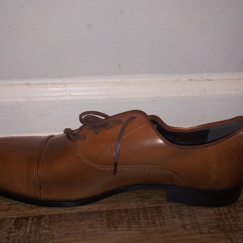 A brown dressy men shoes